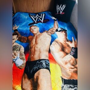 2007 WWE Throw Pillow (13” x 13”) and Fleece Throw Blanket (47”x 58”)